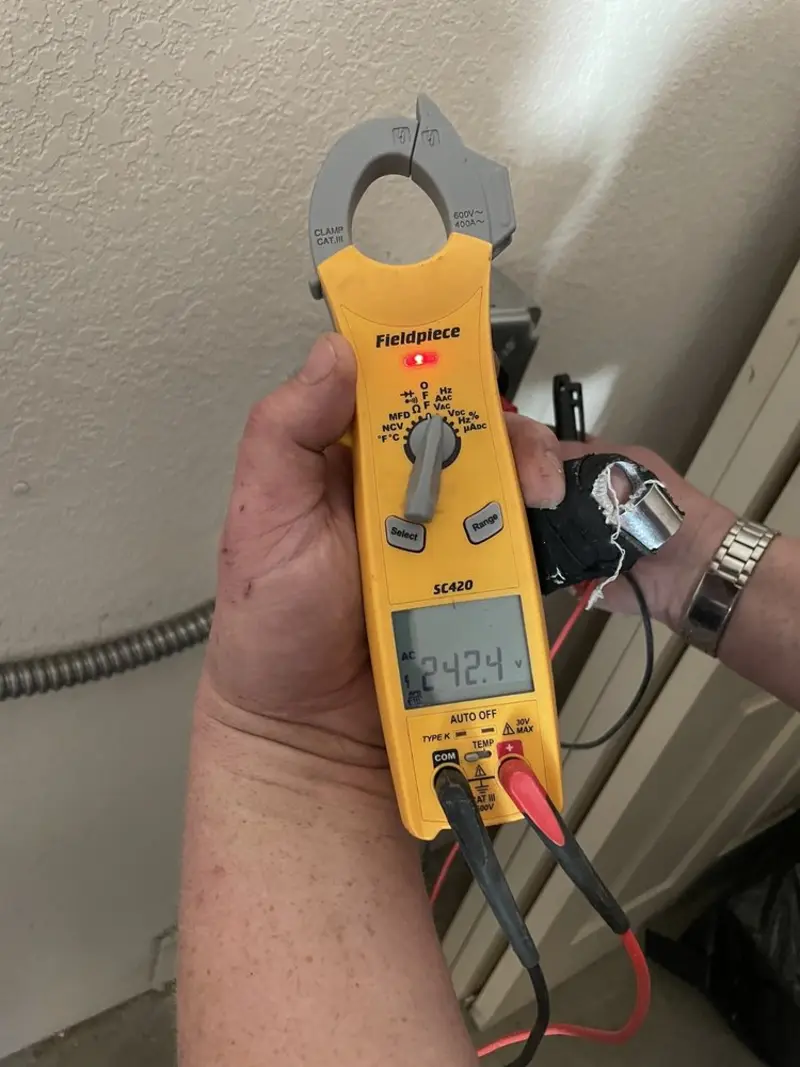 Voltage testing with clamp meter during Generator Installation in Dorr